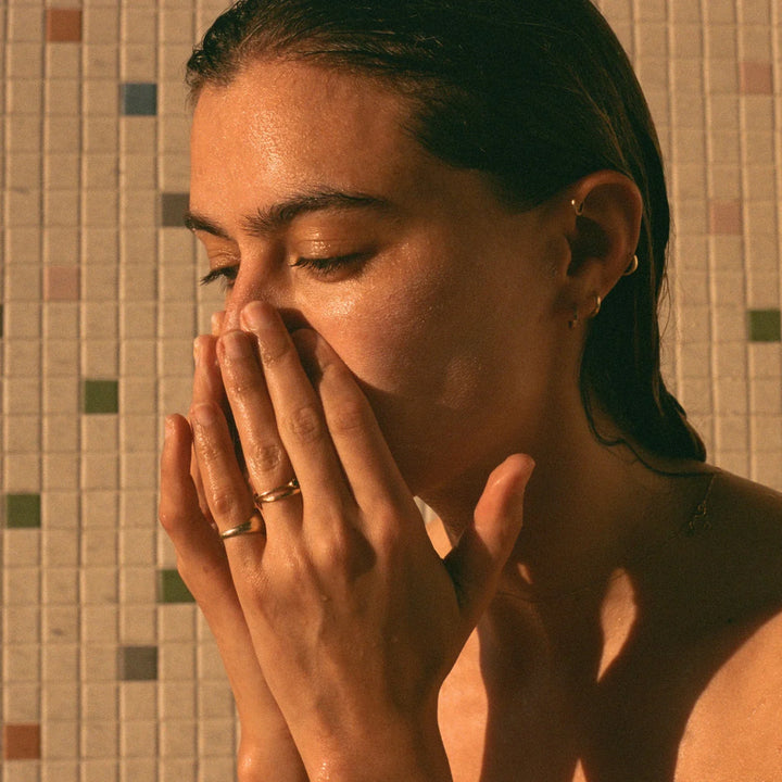 woman using rowse jasmine cleansing balm