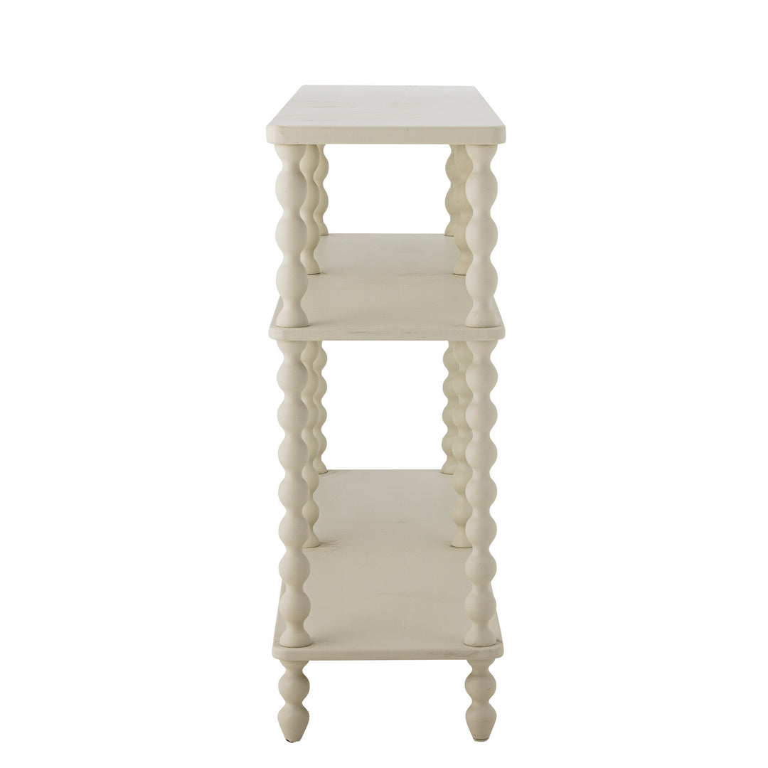 White decorative shelf with three shelves on a white background