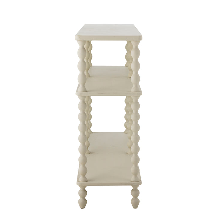 White decorative shelf with three shelves on a white background