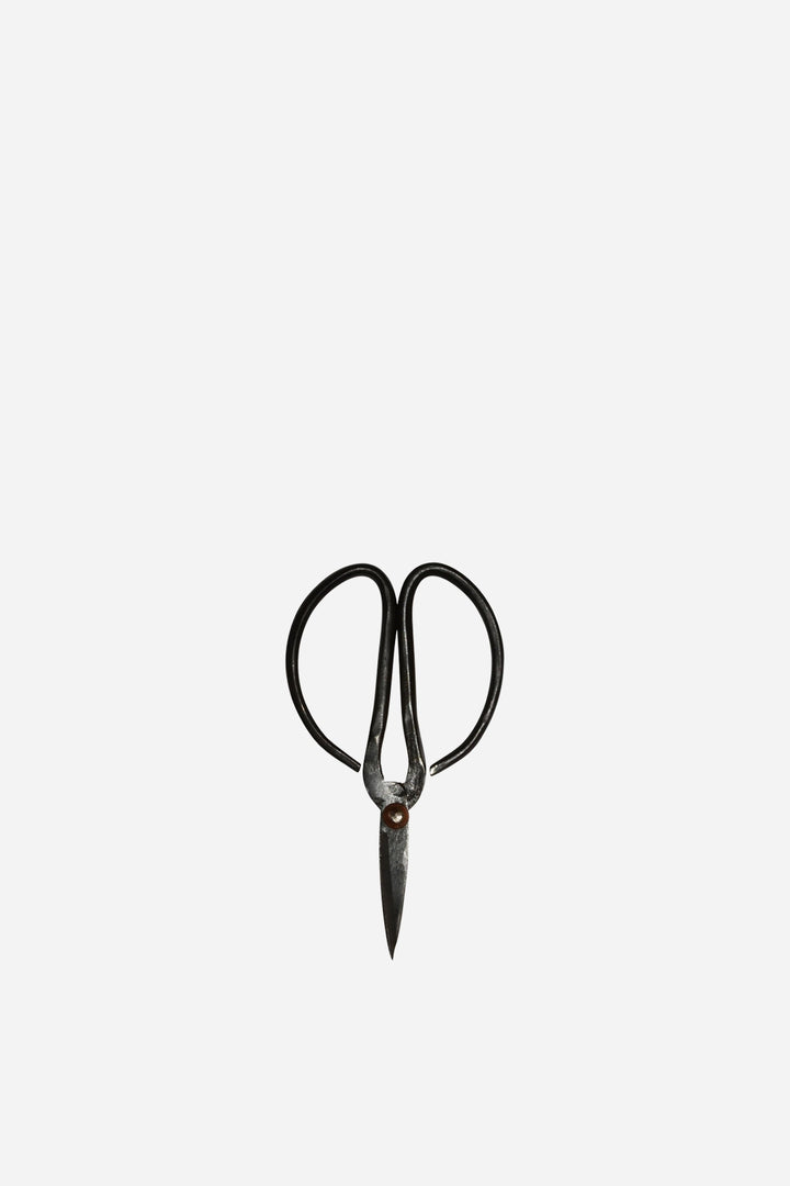 A pair of black-handled vintage style scissors 