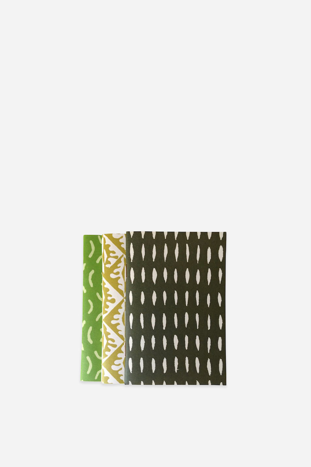 Three patterned notebooks by cambridge imprint