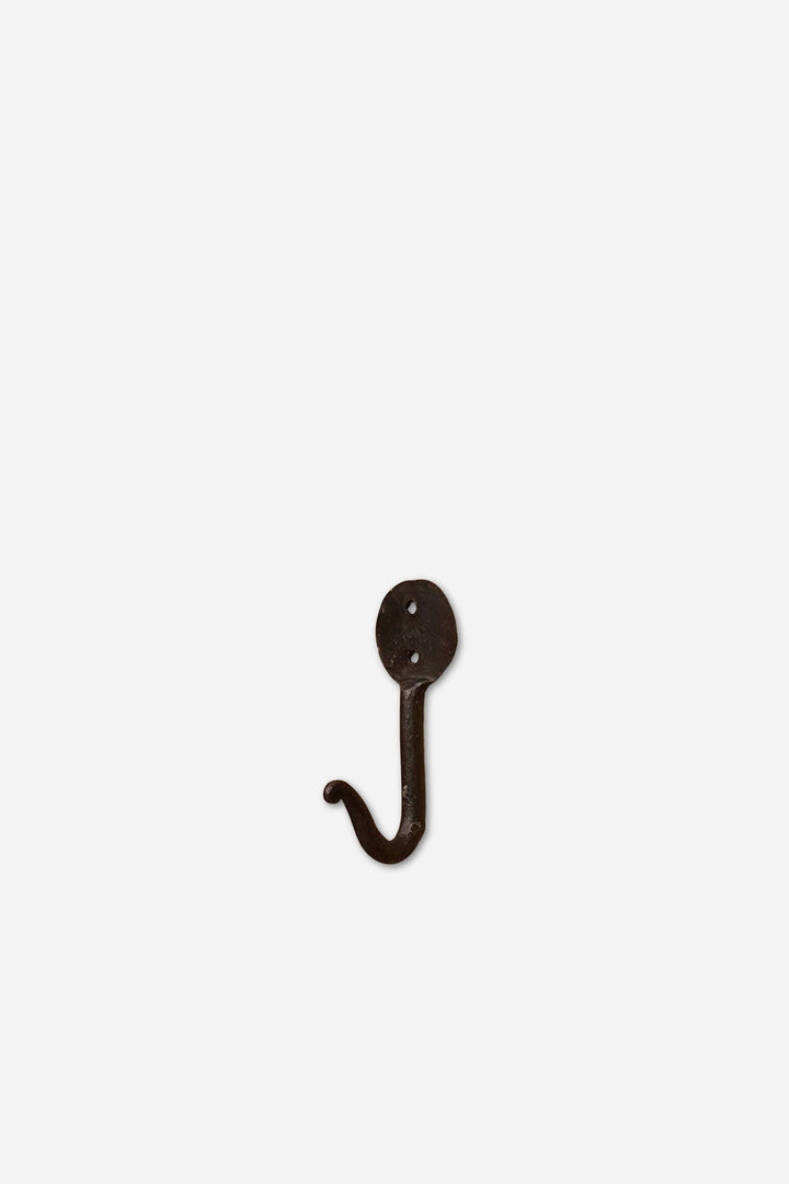 Single brown hook on a white background