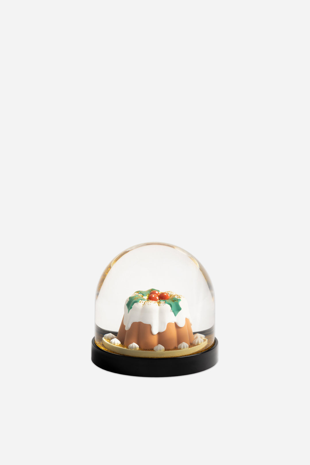 Christmas pudding in a snow globe on a white background