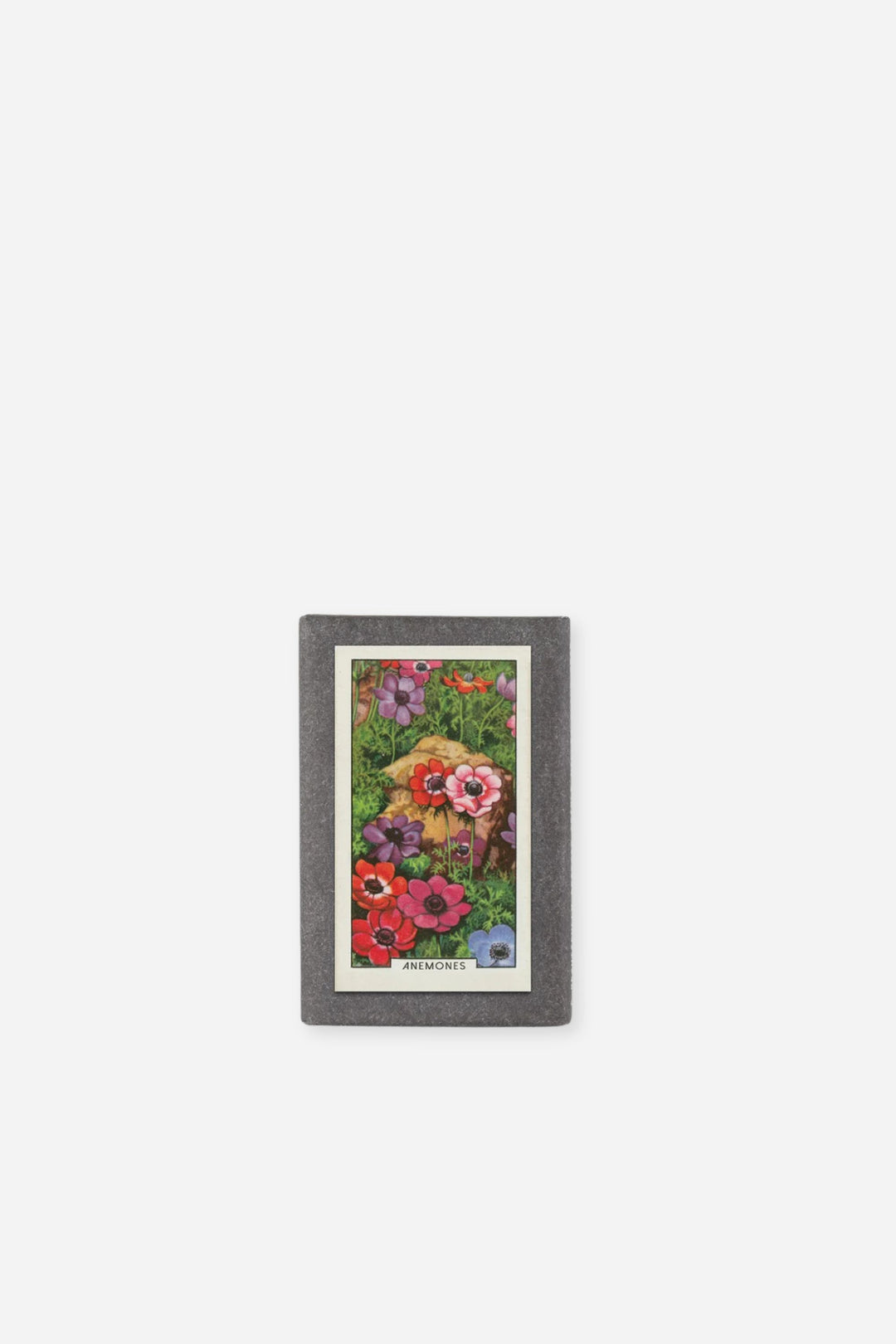A rectangular bar of soap featuring a colourful vintage-style floral packaging
