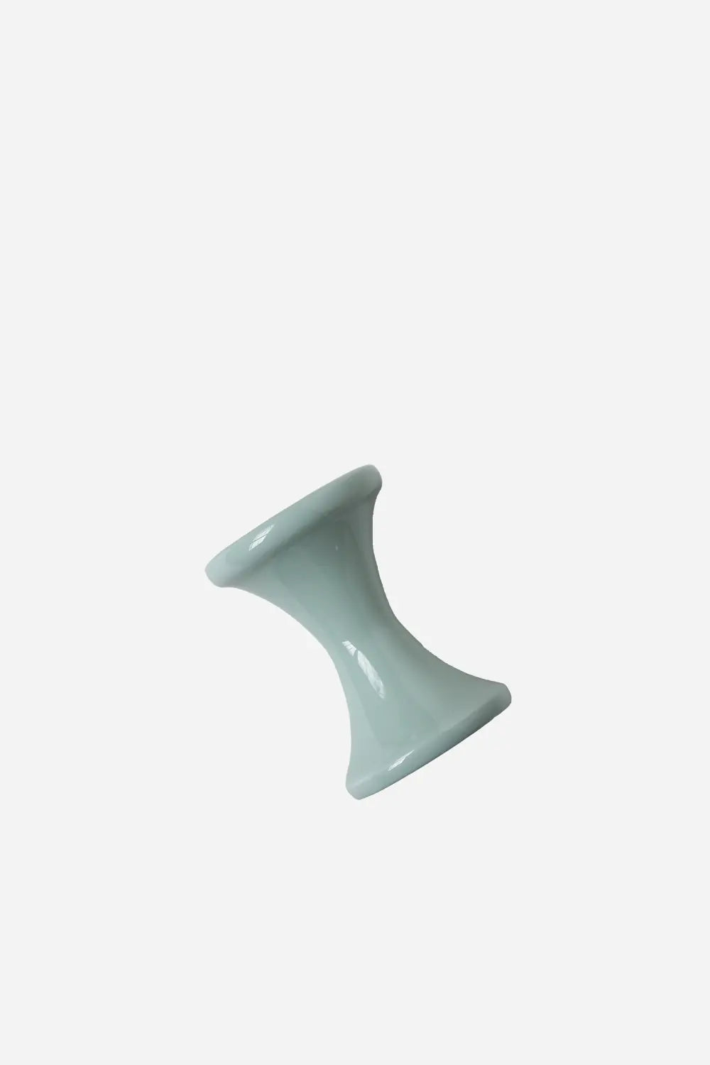 Black wall-mounted shower control valve on a white background