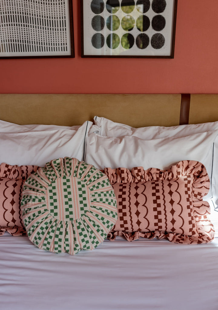 geometric patterned scatter cushion on bed from TBCo