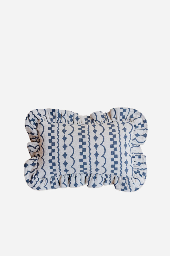 navy and cream geometric woven cushion with ruffle trim