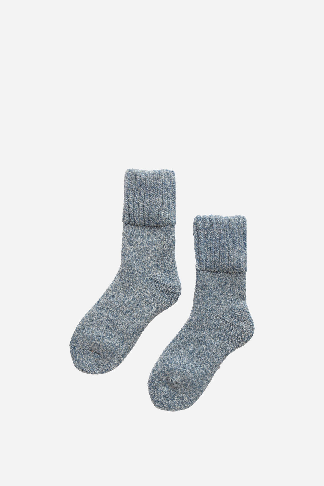 Pair of blue socks on a white background