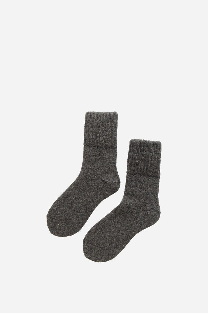 Pair of gray socks on a white background