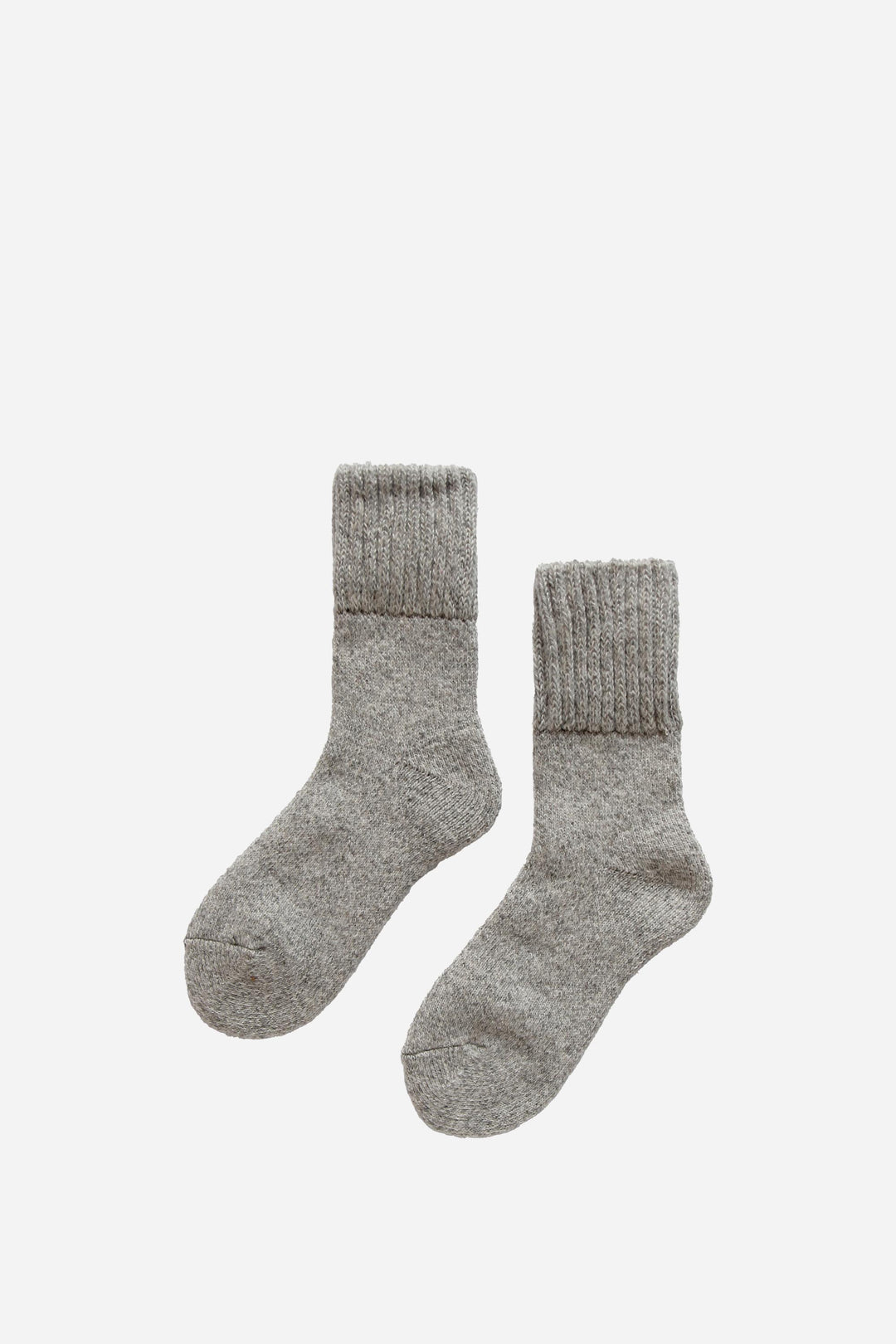 Pair of gray socks on a white background