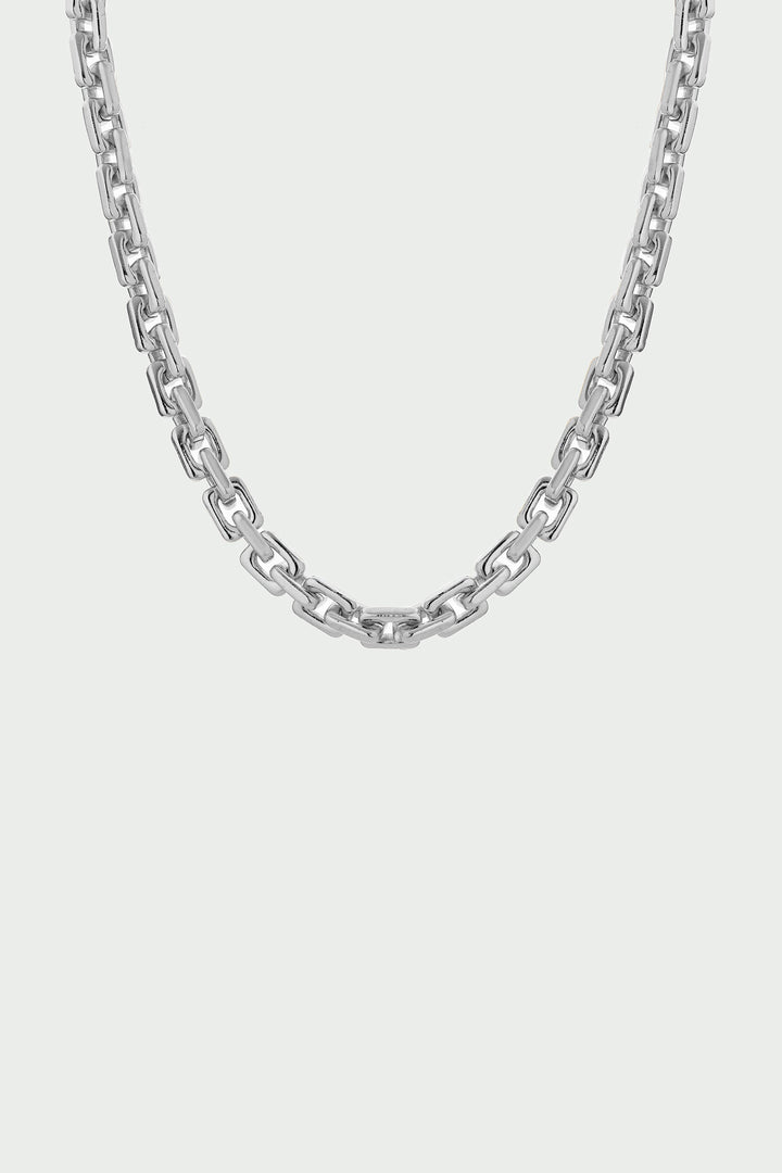 Silver chain necklace on a white background