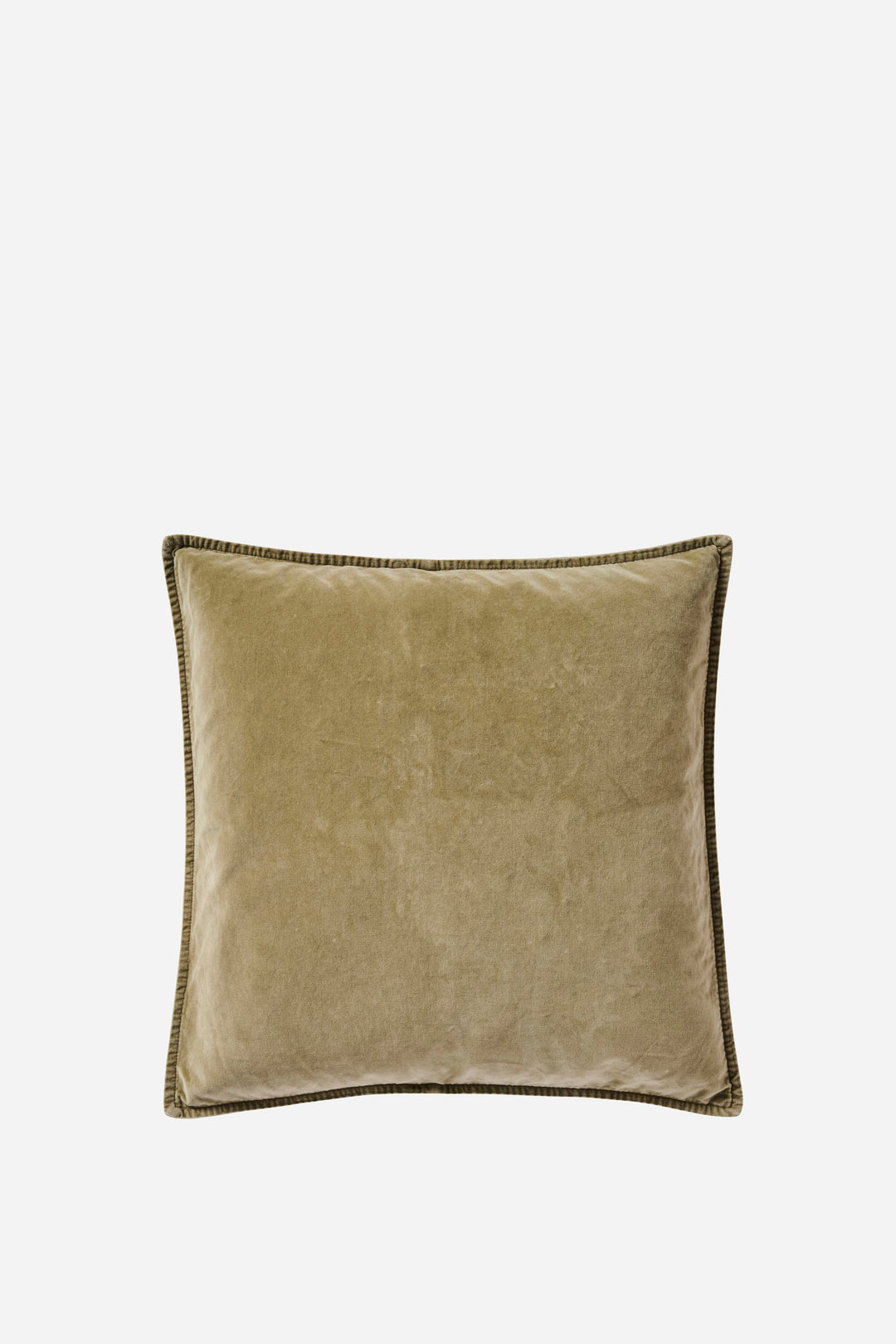 Green velvet cushion on a white background