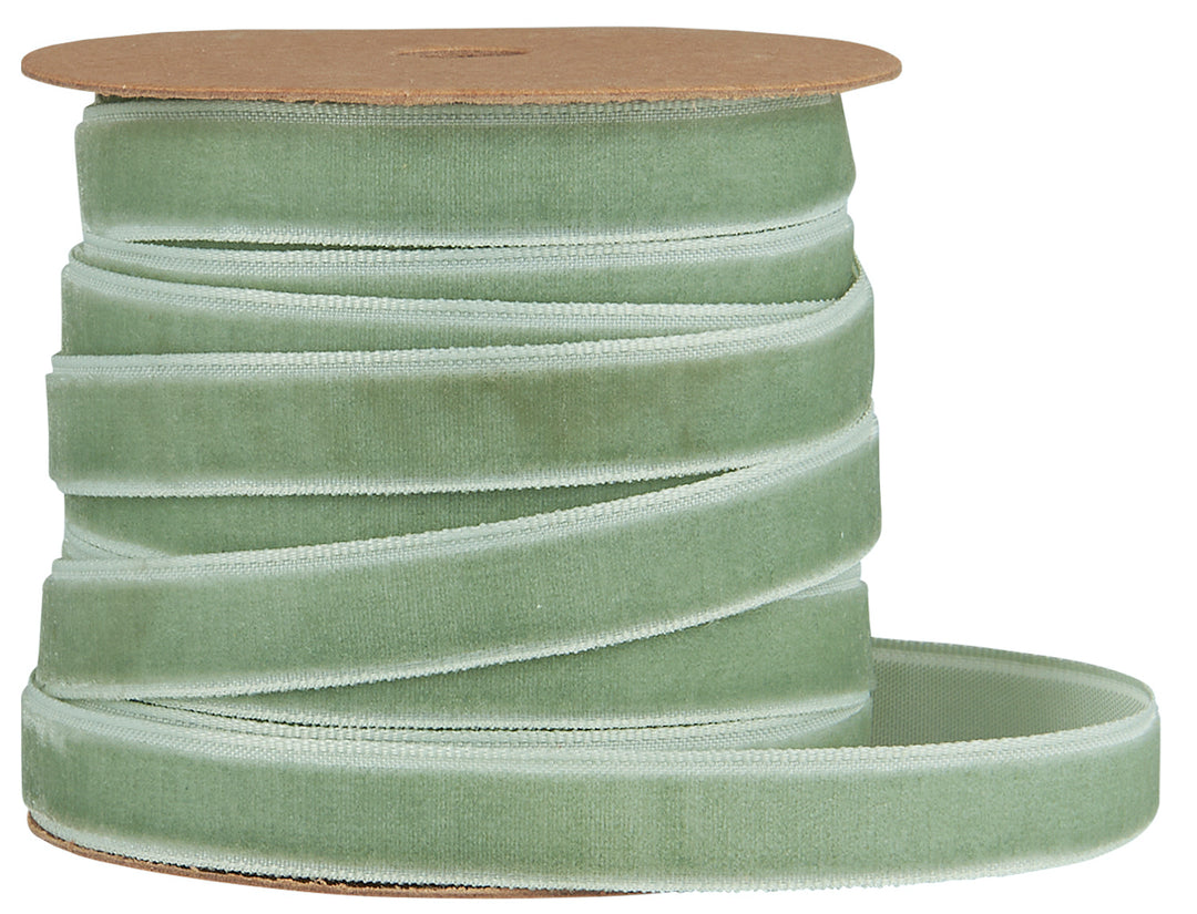dusty green velvet ribbon on a spool