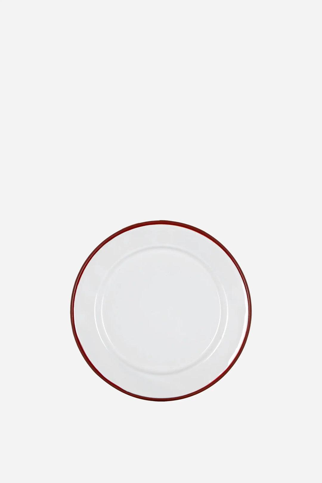 white enamel dinner plate with red rim
