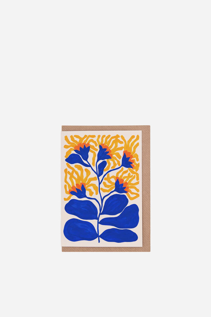 greeting card with blue floral design on a yellow background