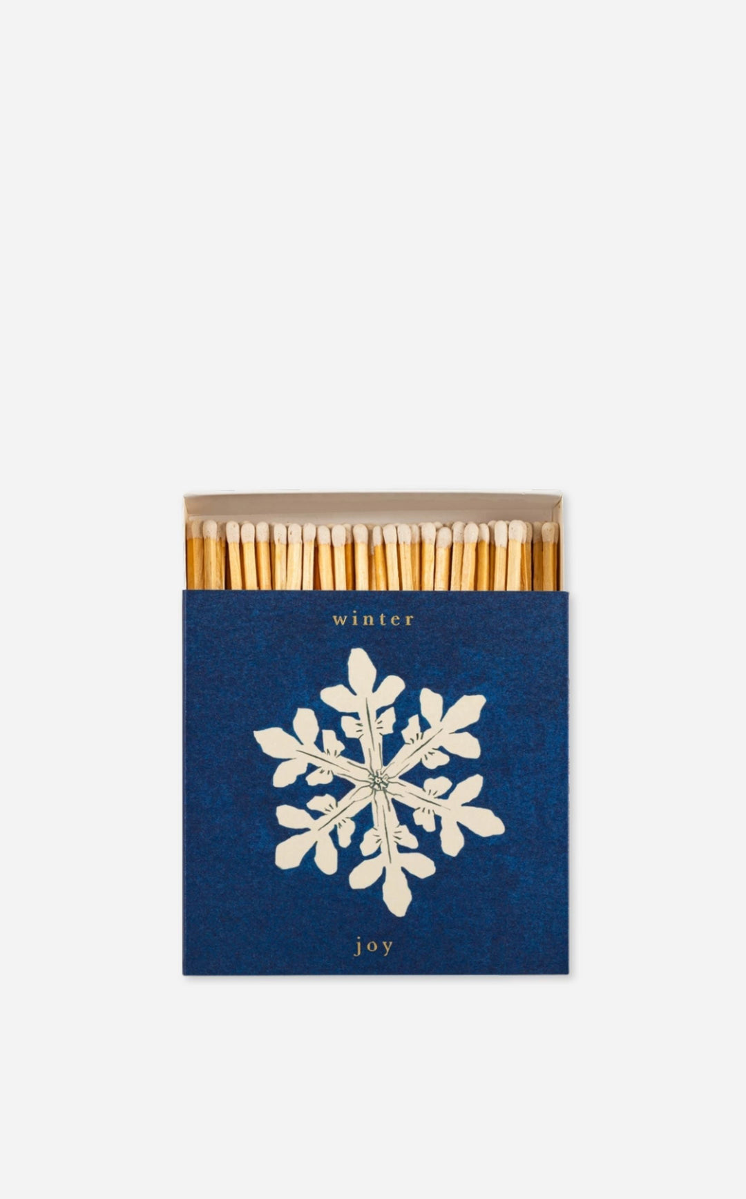 Matchbox with matches and a snowflake design on a white background