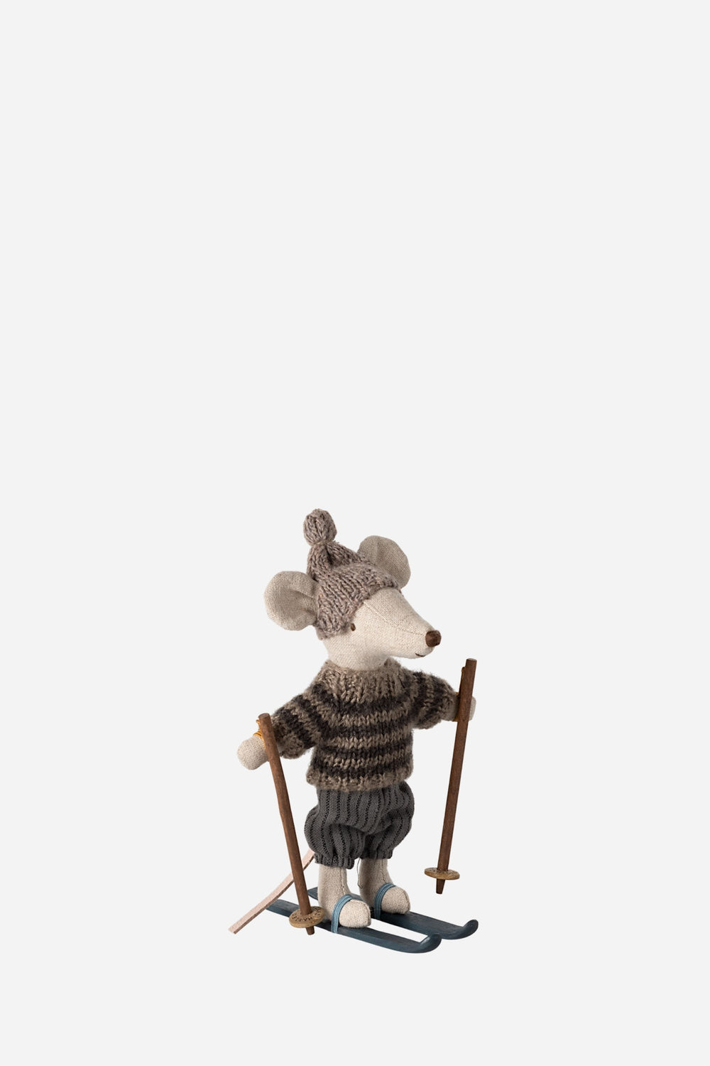 Stuffed toy mouse in skiing attire on a white background