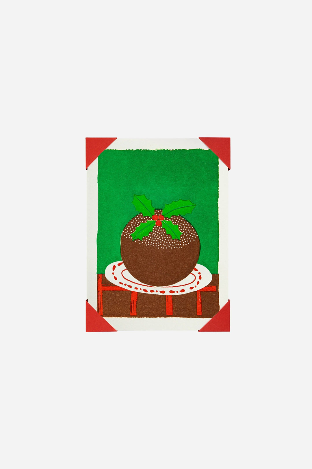 Decorative card with a Christmas pudding design on a green background