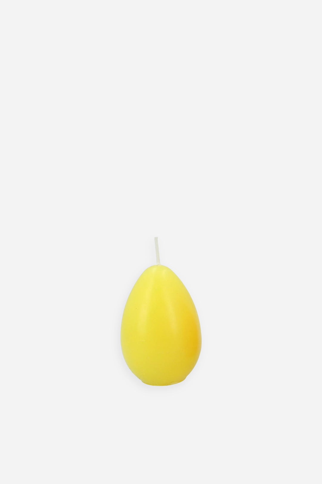 yellow egg shaped candle